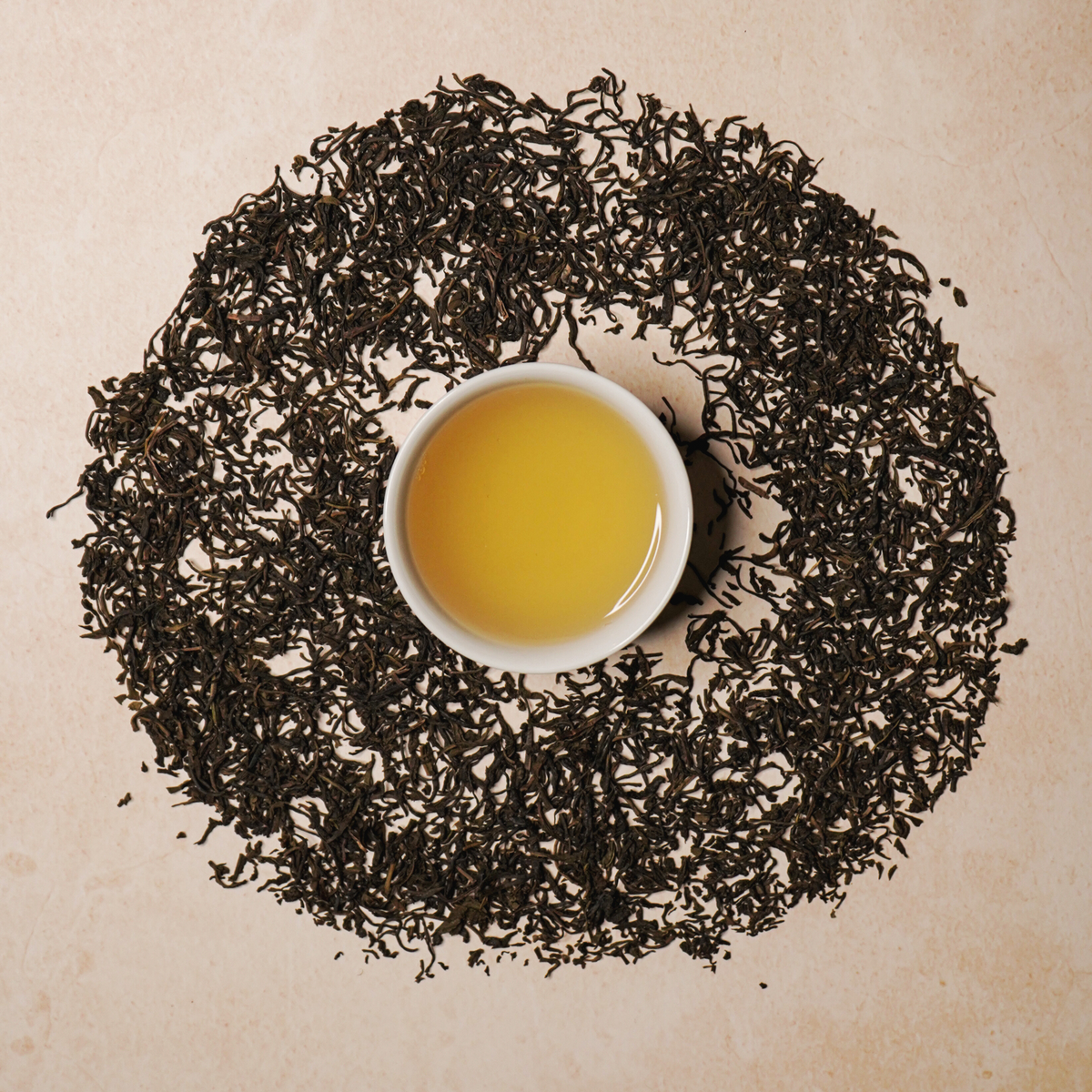 Golden cup of Green Mist Nilgiri Green Tea with a smooth, fresh and sweet flavour profile.