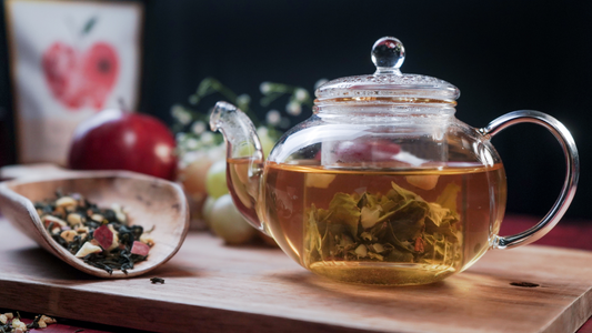 Fruit Green Tea brewed in a teapot with dry leaf