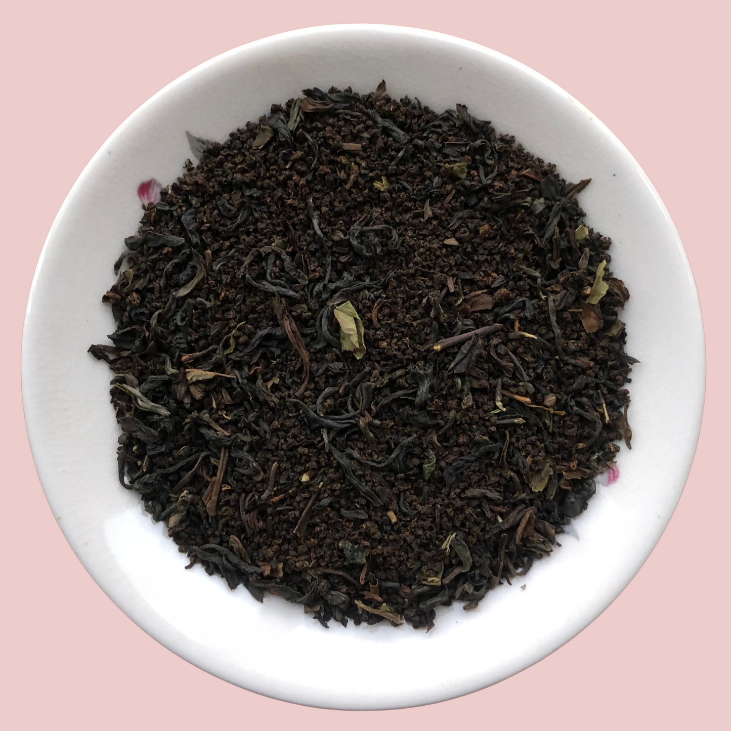 Premium Assam Darjeeling tea blend loose black tea leaves in a plate