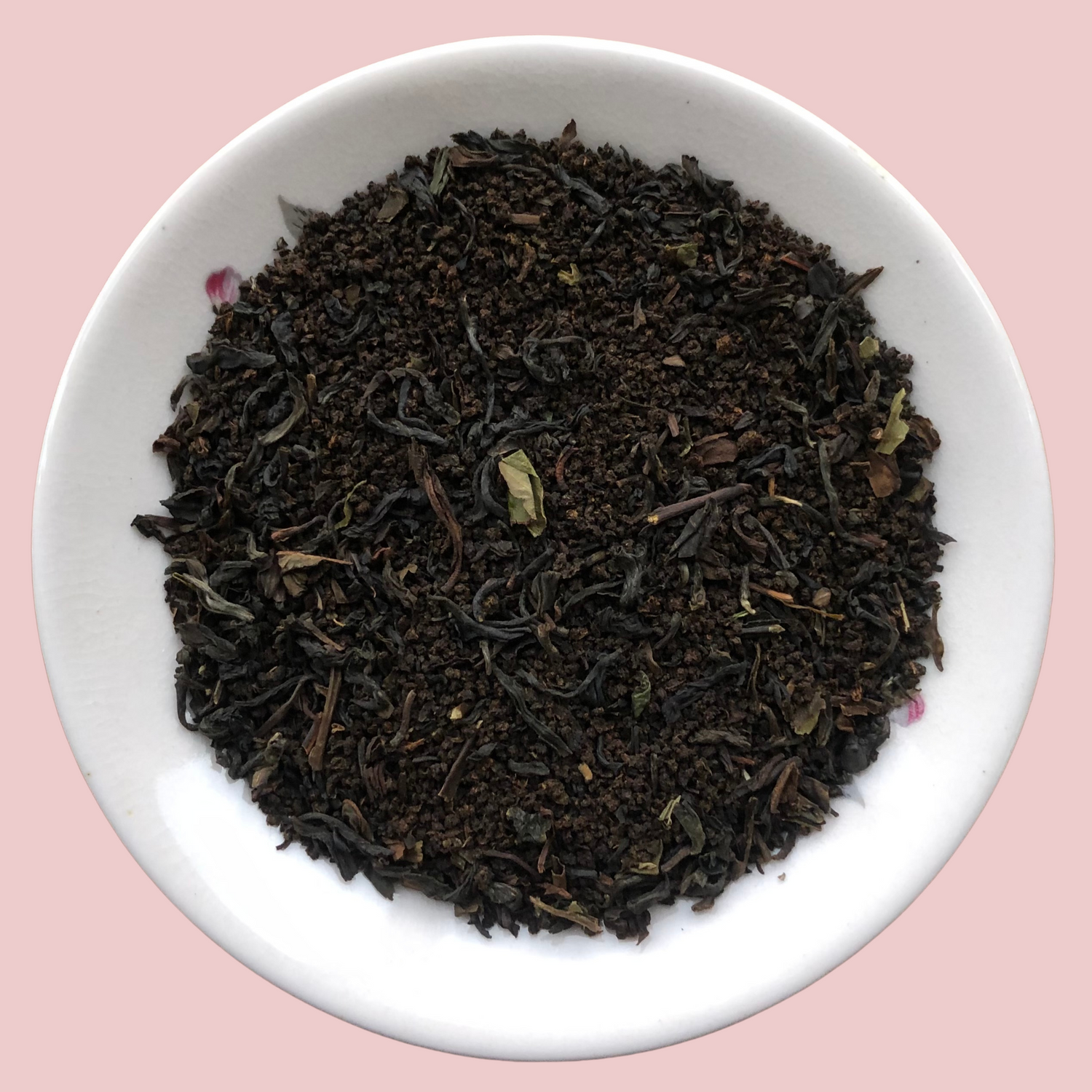 Premium Assam Darjeeling tea blend loose black tea leaves in a plate