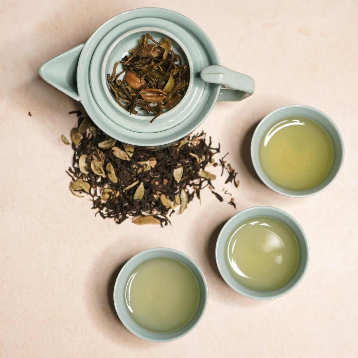 Kabuli Kahwa cardamom green tea brewed in cups by ArtTeas® — sweet refreshing Nilgiri cardamom tea India