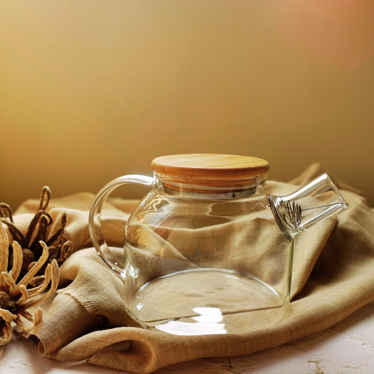 ArtTeas® 1 litre glass teapot with wooden lid and stainless steel infuser on neutral fabric backdrop