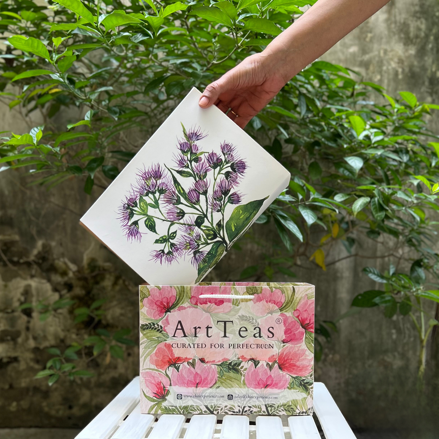 Original watercolor botanical art on ArtTeas Darjeeling tea packaging - handpainted by founder Aarti Khanna