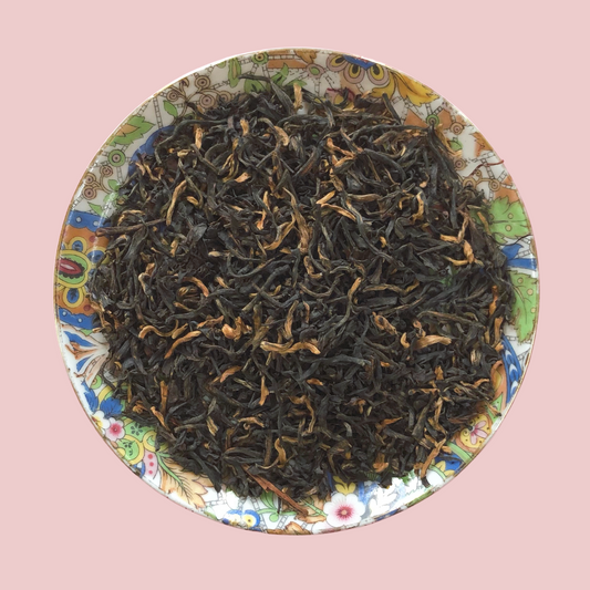 Premium Assam Gold loose leaf orthodox black tea with bright golden tips from Assam, India. ArtTeas® 