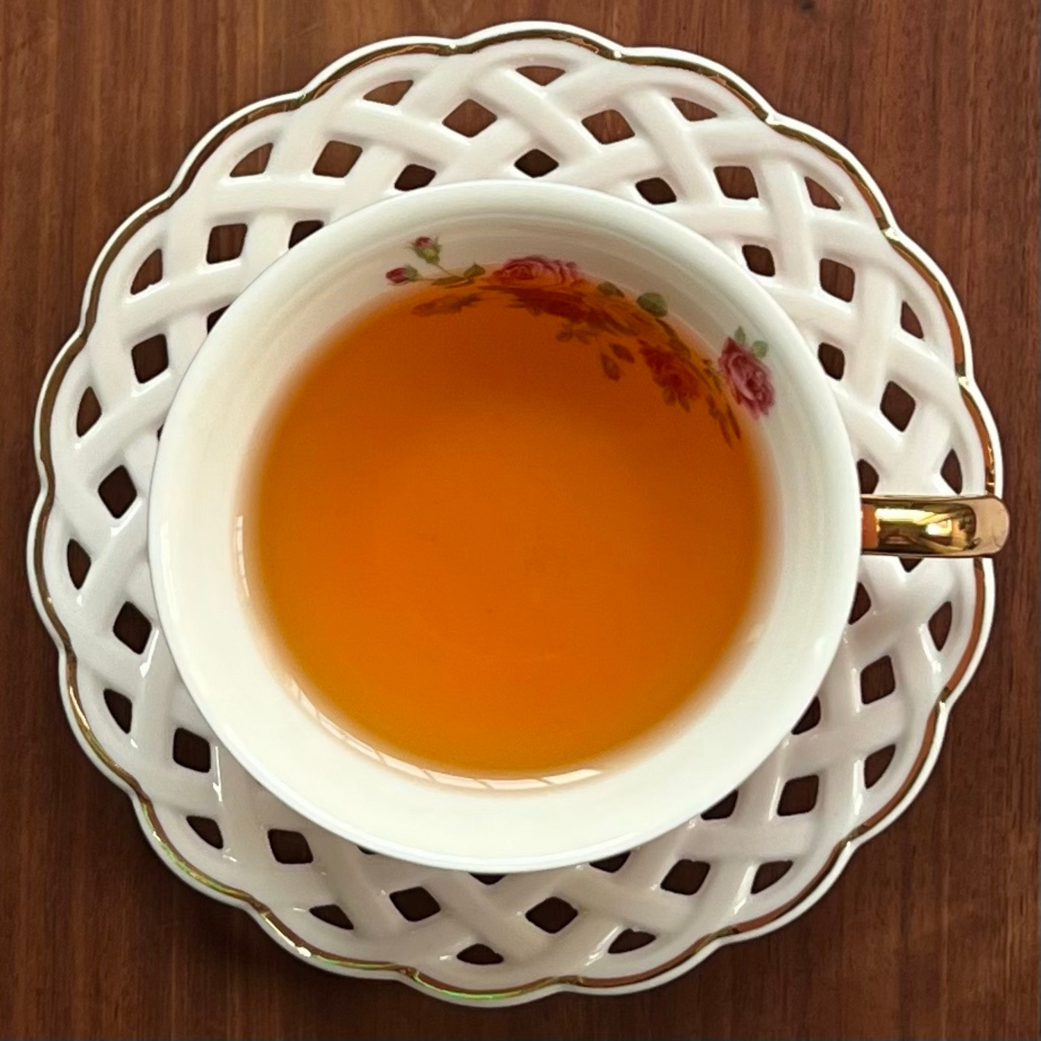Rooibos Kiss brewed in vintage china cup — naturally sweet caramel South African rooibos tea by ArtTeas® India