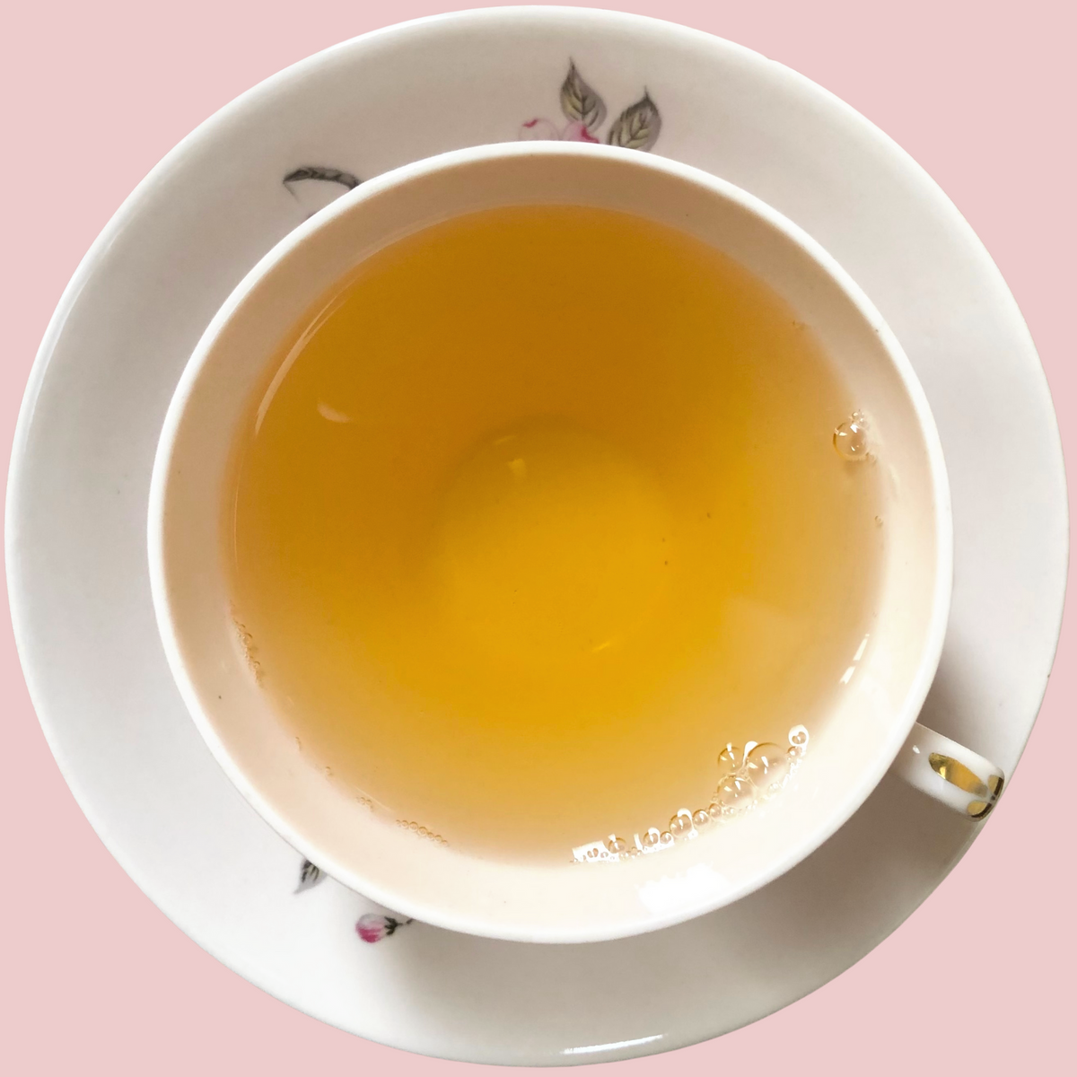 Brewed Green Mist Nilgiri Green Tea by ArtTeas in a pink teacup