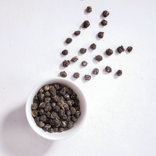 Hand-rolled Jasmine Pearls green tea leaves 
