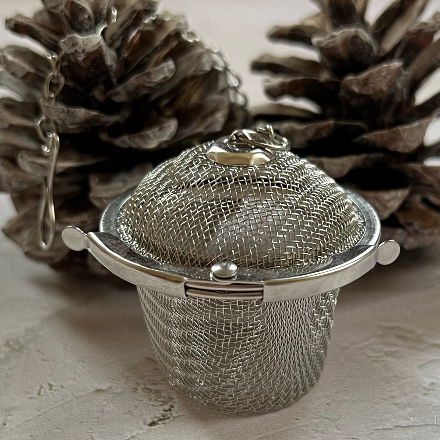 Stainless steel tea infuser basket for brewing loose leaf tea by ArtTeas®