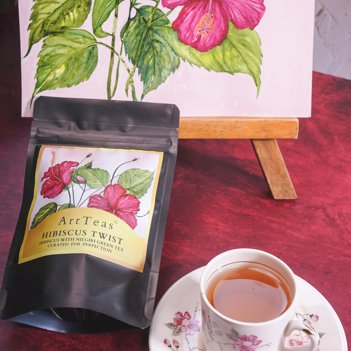 ArtTeas®  Hibiscus Nilgiri Green Tea loose leaf tea with botanical packaging