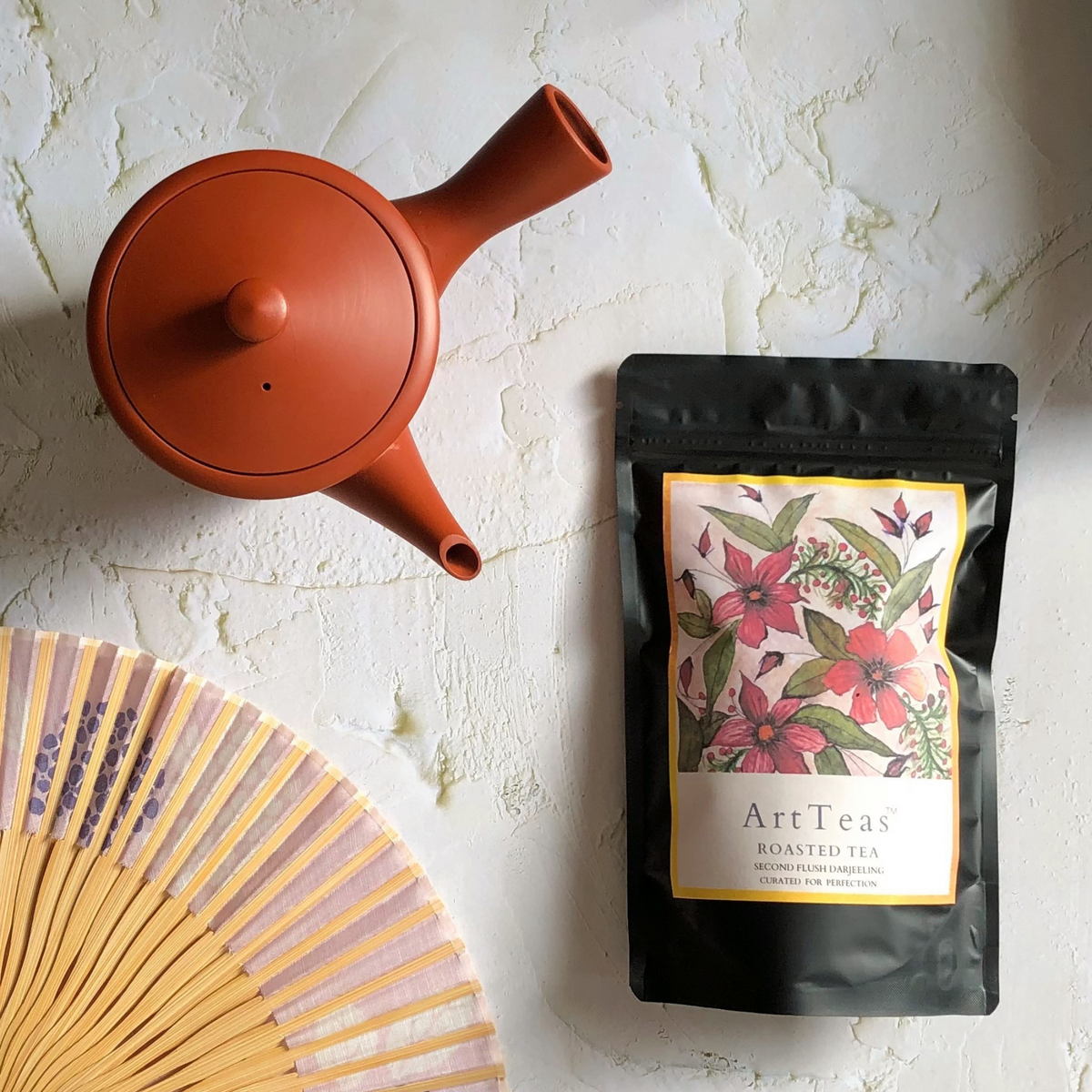 ArtTeas® Roasted Tea with botanical watercolor floral painting on labels by the founder Aarti Khanna