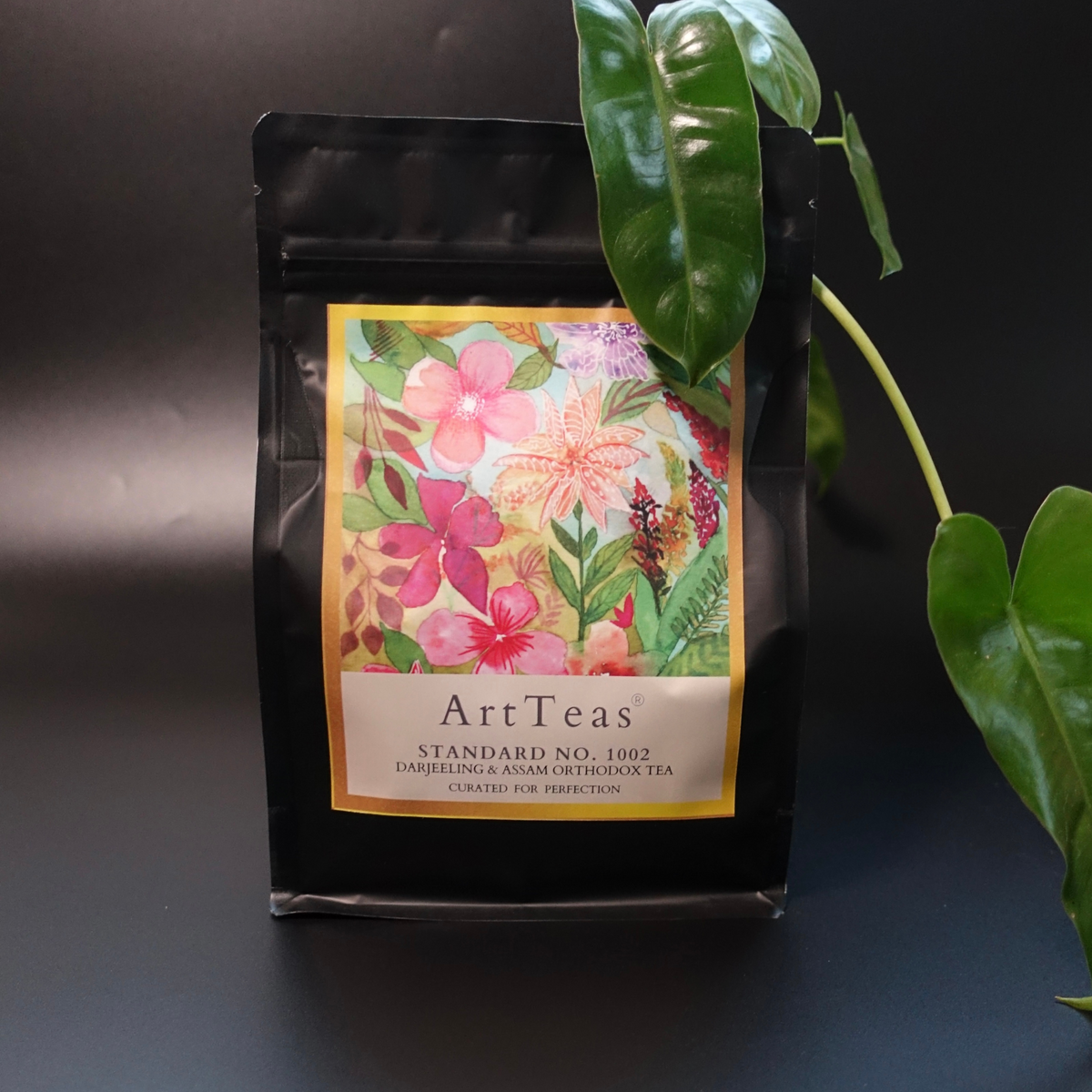 ArtTeas® Darjeeling & Assam Orthodox Tea Blend with floral artwork by the founder - Aarti