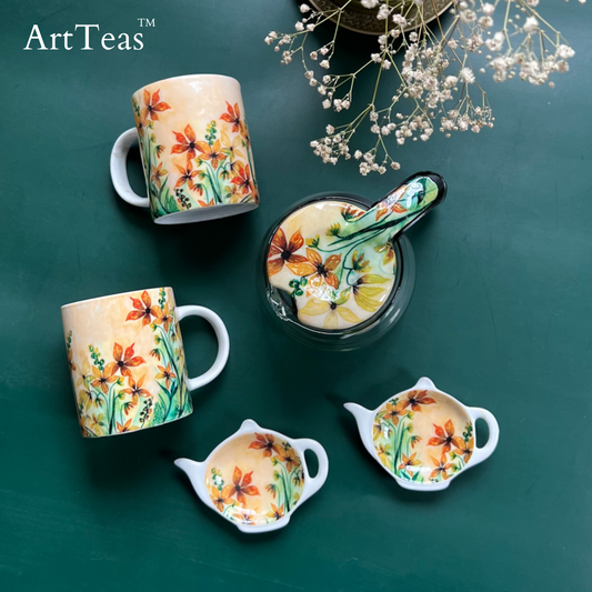 ArtTeas® watercolor floral tea set - glass teapot with 2 ceramic mugs and 2 cookie plates featuring original botanical painting by artist Aarti Khanna India