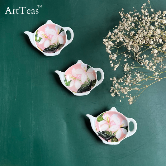 Collection of ArtTeas® ceramic tea bag  plates with hand painted watercolor botanical prints by founder  artist Aarti Khanna India